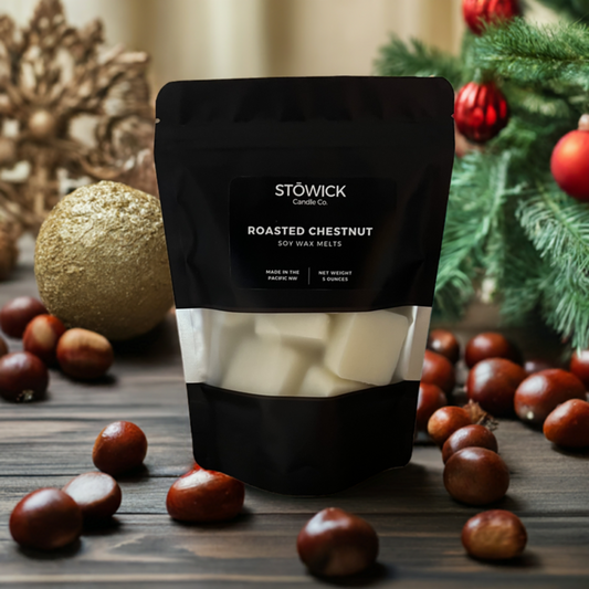 a 5 ounce black bag of pure soy wax melts sitting on a table with roasted chestnut fragrace