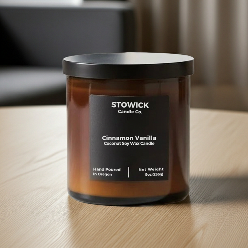 Stowick Candle Co. cinnamon vanilla tumbler candle on a wooden surface