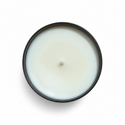 A Birds Eye view on a fall and Santal tumbler candle with a white background 