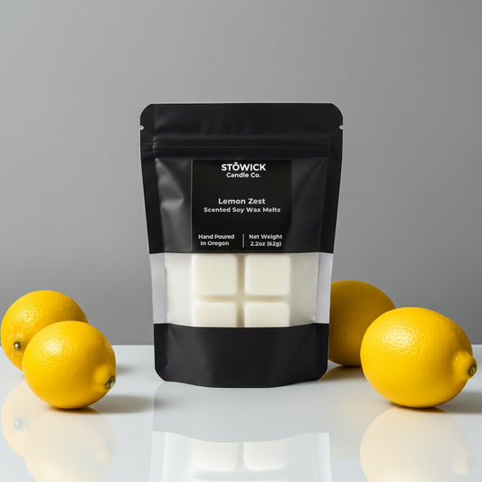 Stowick Candle Co. lemon zest wax melts packaging with lemons on a gray background