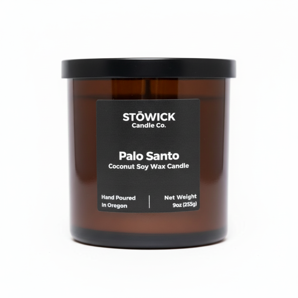 Stöwick Candle Co. Palo Santo candle in amber jar with black lid on a white background
