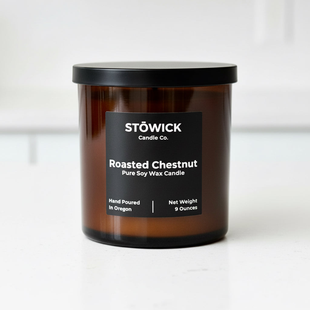 A roasted chestnut scented candle on a kitchen counter