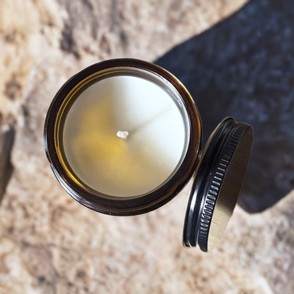 a mini candle in oregon trail scent